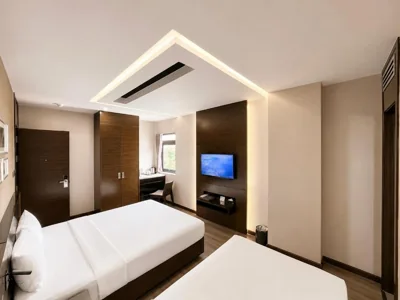 Deluxe-Dreibettzimmer — Queen Ann Hotel